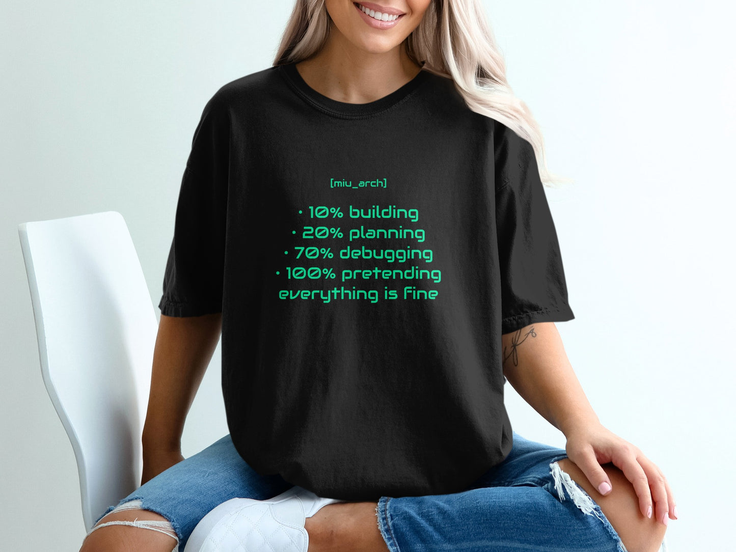 Black t-shirt with a list: 10% building, 20% planning, 70% debugging, 100% pretending.