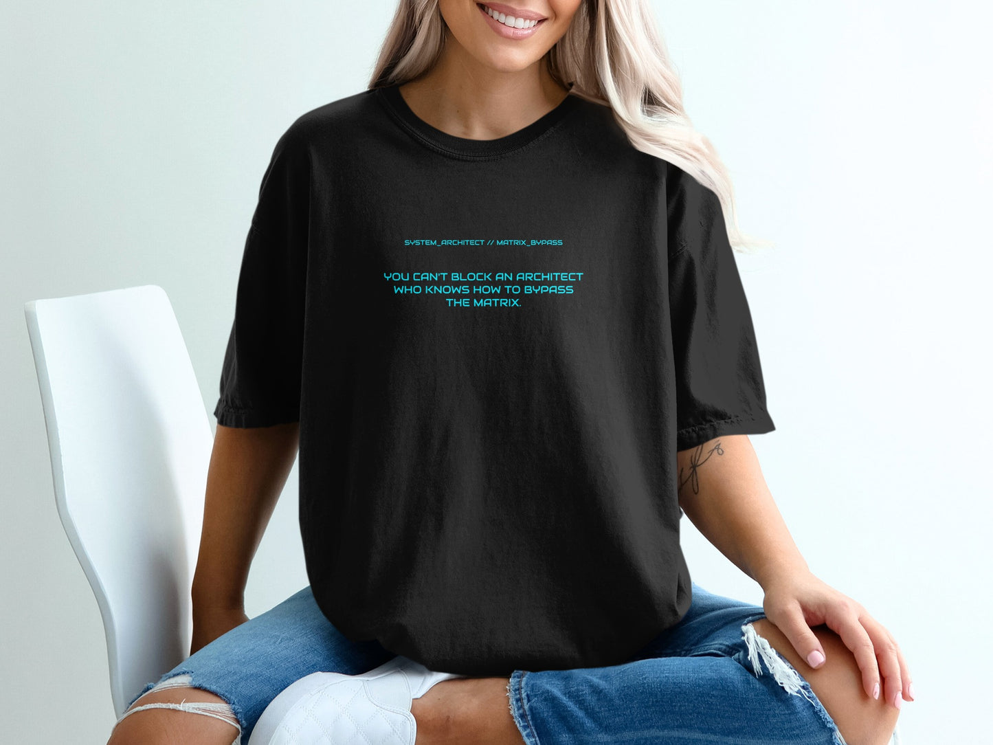 Black t-shirt with "System Architect // Matrix Bypass" and quote.