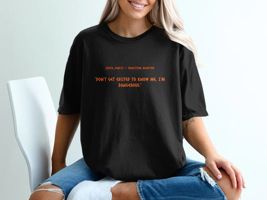 Black t-shirt with "DATA_FAULT // INJECTION_REJECTED" and "DON'T GET EXCITED TO KNOW ME, I'M DANGEROUS."